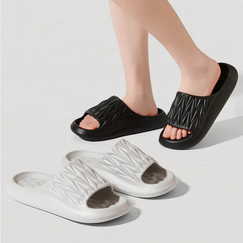Pair of EVA leaf texture design slippers in multiple colour options on a white background.
