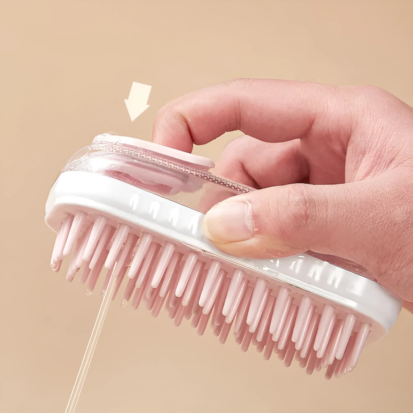 Grey and pink silicone bath massage brush for washing dogs and cats.