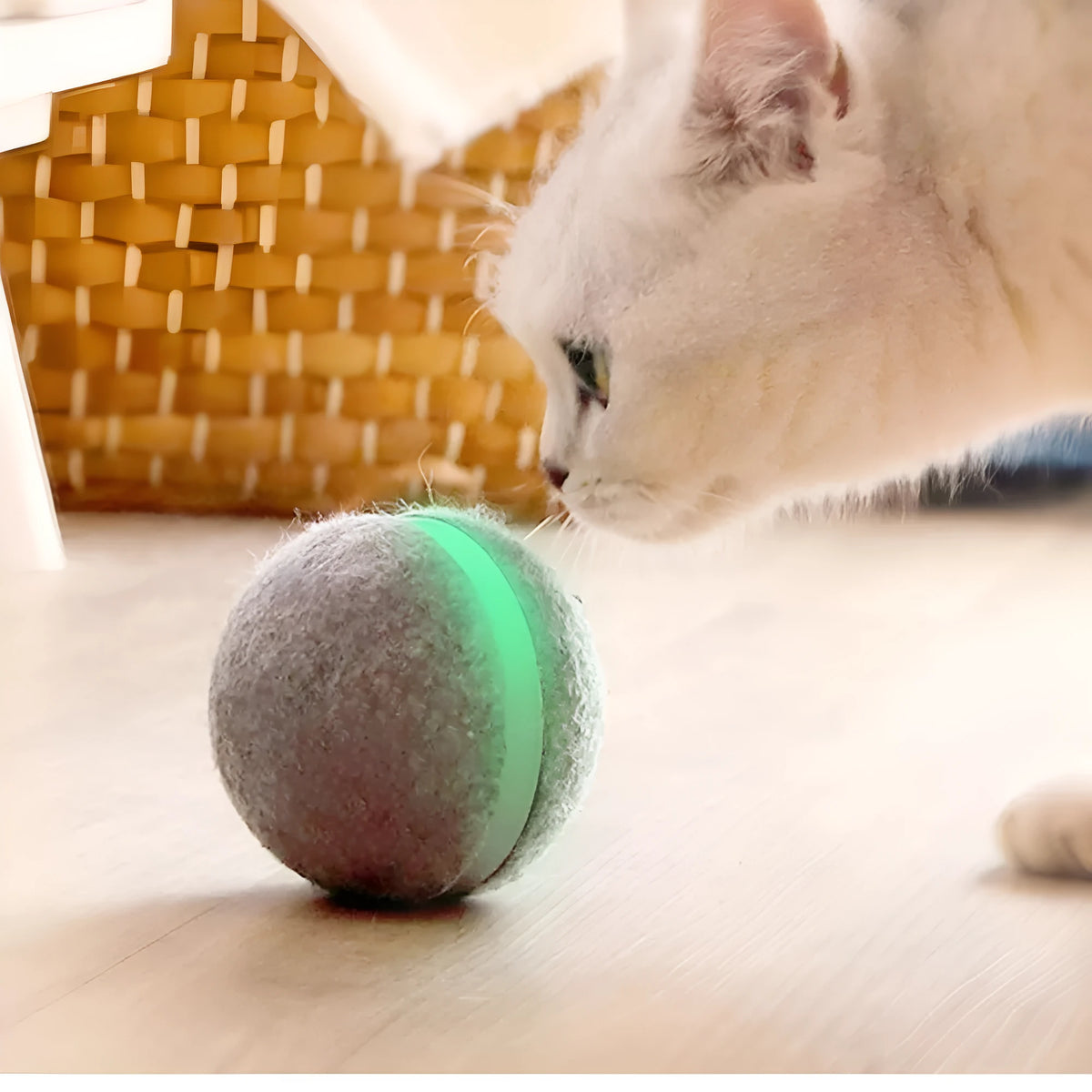Interactive cat toy bouncing ball with LED lights, silicone exterior, USB rechargeable, blue colour