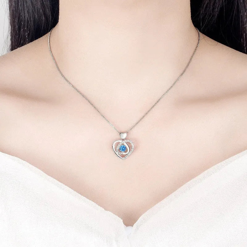 Blue diamond heart necklace and bracelet set with electroplated copper construction and gem inlaid pendant