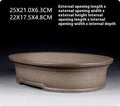 Handmade antique oval bonsai pot in purple sand clay measuring 25cm by 21cm