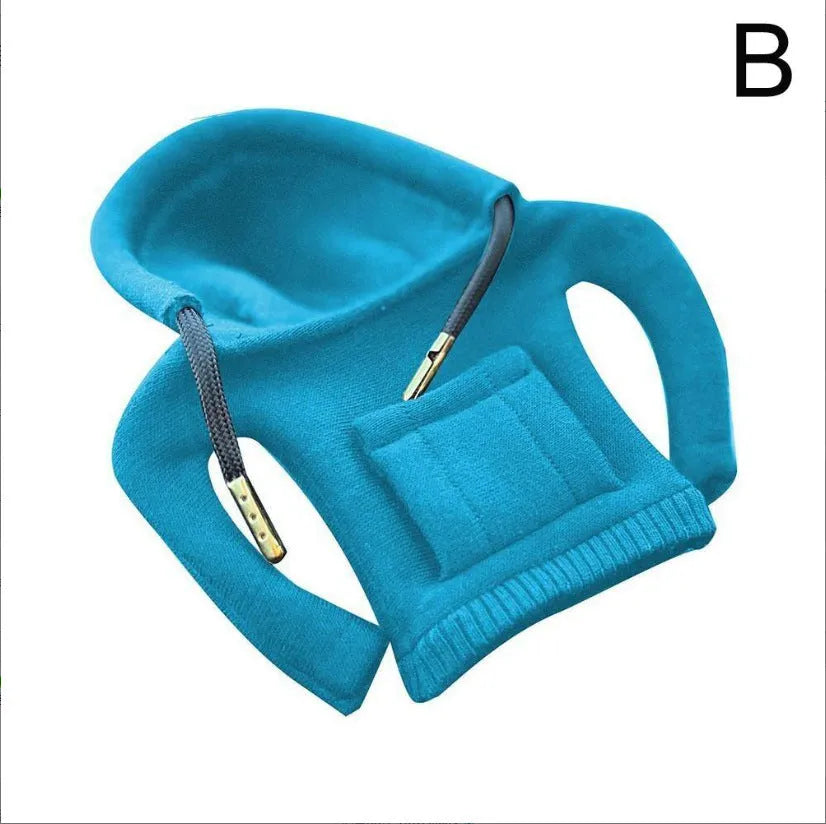 Cloth car gear shift knob hoodie cover in multiple colour options next to a gear lever.