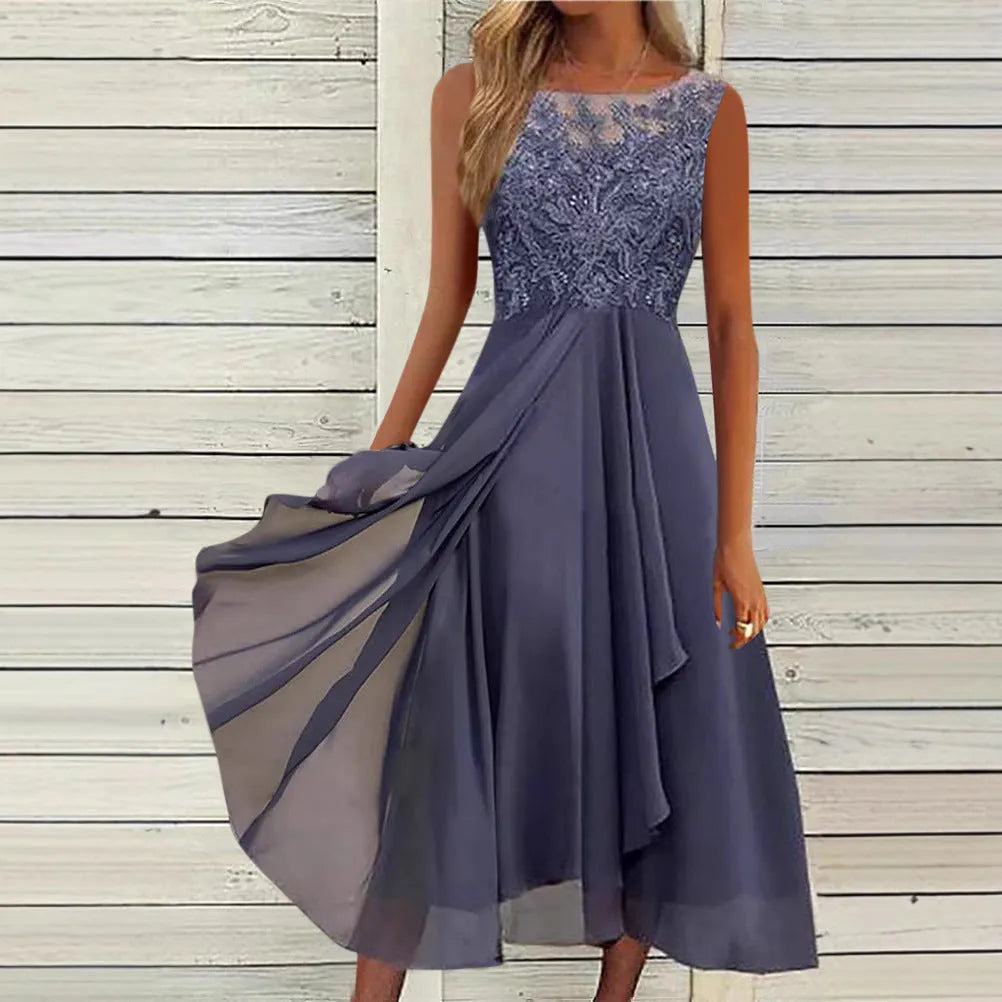 Women's sleeveless green chiffon dress with lace hollow-out detail on a mid-length skirt.