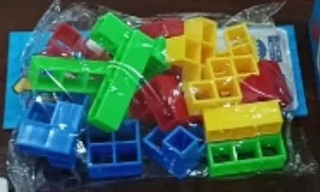 Plastic balance stacking game with colourful blocks on a chassis