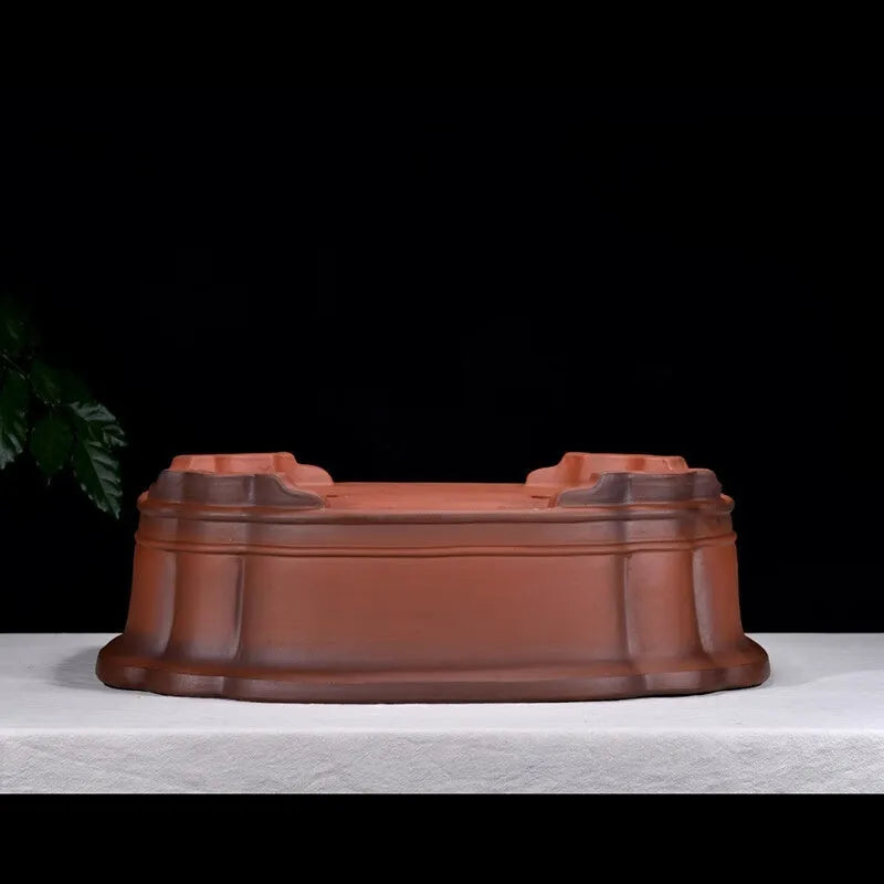 Antique finished rectangular purple clay flowerpot with detailed tree stump and floral relief carving.