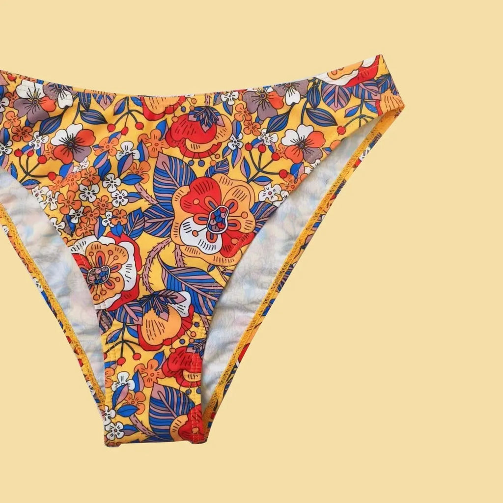 Plus size women's floral print bikini with adjustable straps, two-piece swimsuit set in colourful patterns