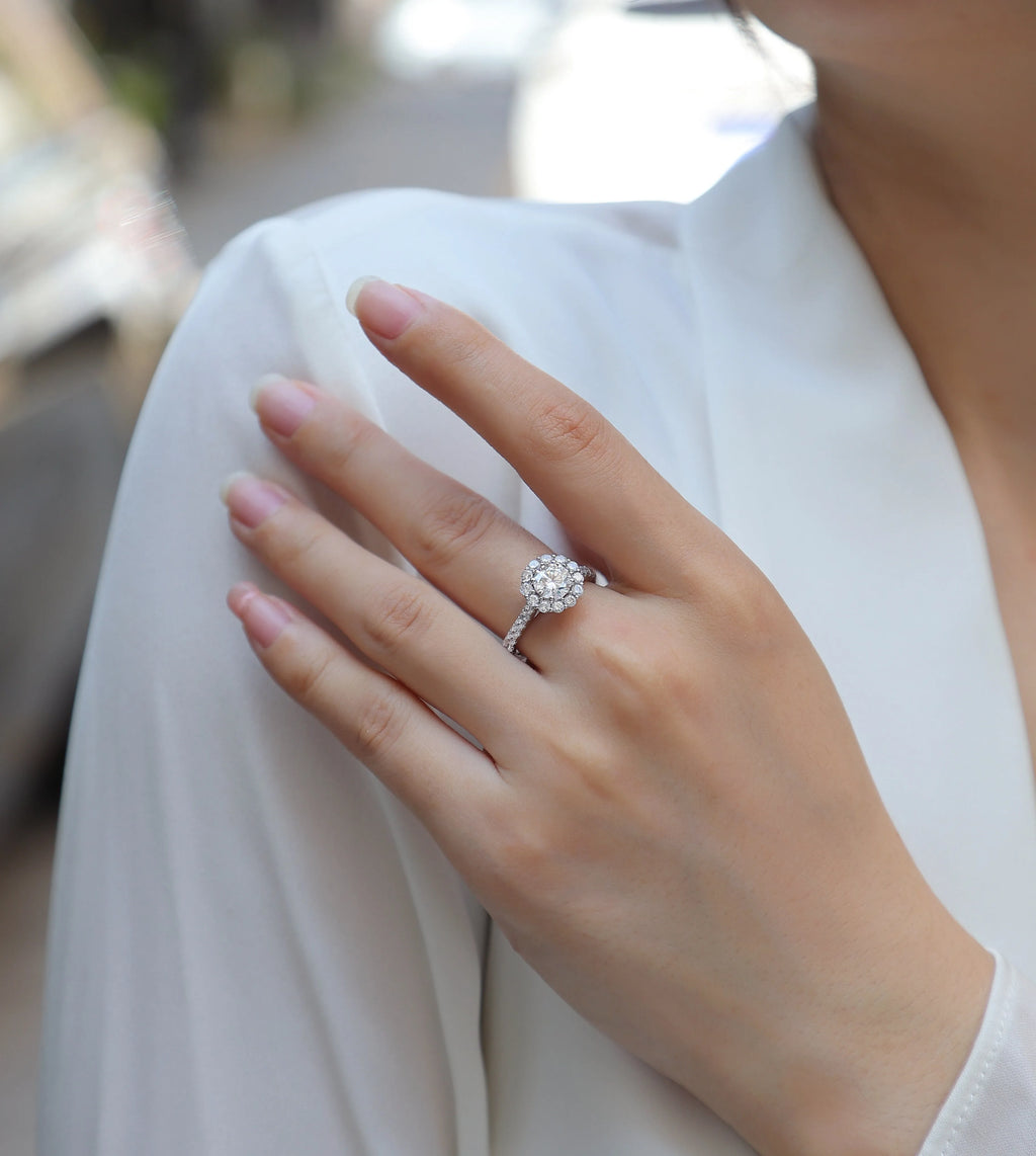 1-carat moissanite wedding ring set in S925 silver with platinum plating on white background