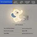 White cartoon elephant wall light with tricolour dimming, 22cm balloon elephant design, on a wall in a child's room