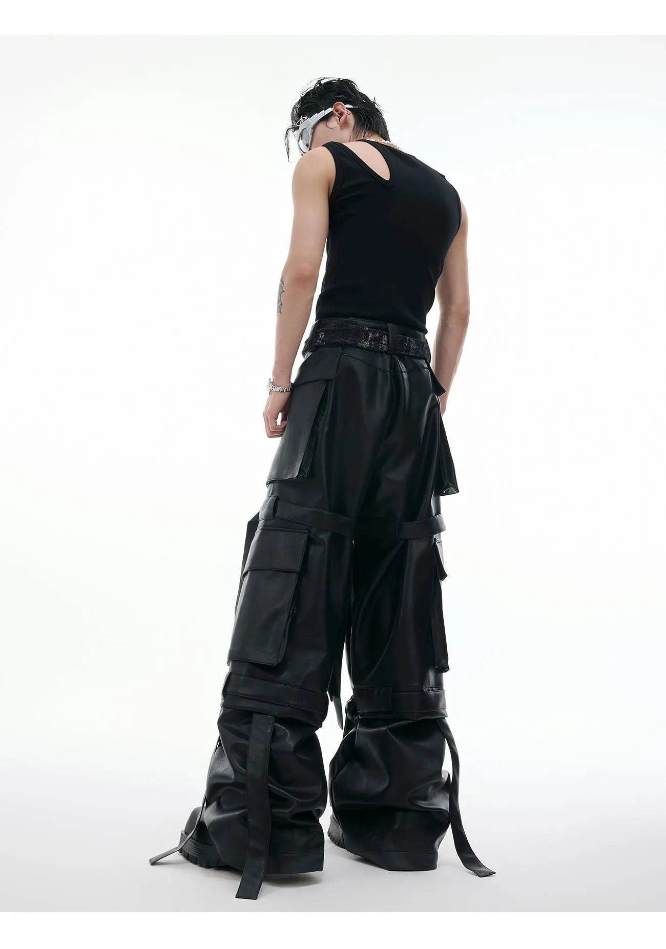 Black retro multi-pocket pants with quilted stitching detail and loose fit design
