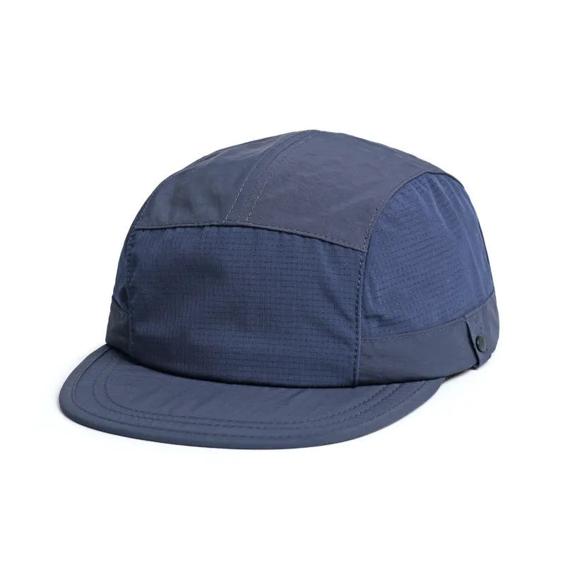 A breathable dome cap with a soft tongue, shown in an available colour like army green or wine red.
