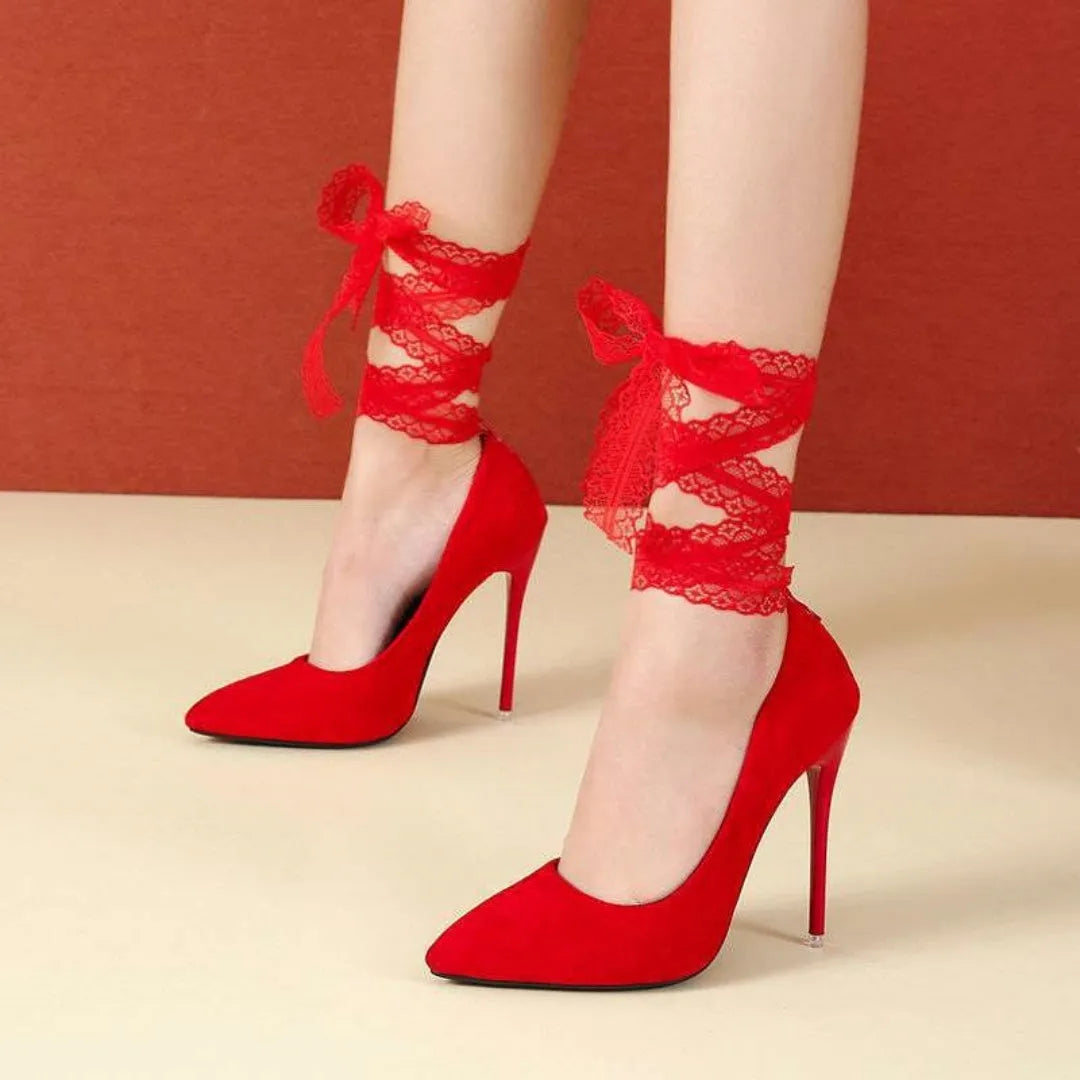 Black pointed toe high heel shoes with thin fabric straps and 12cm platform heel