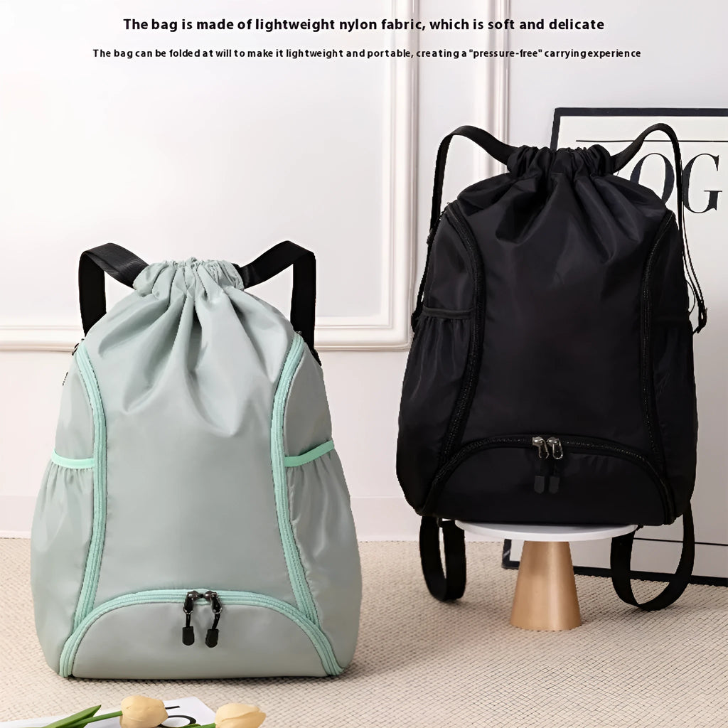 Large black cube-shaped sports backpack with drawstring closure for travel and fitness use