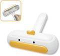 Yellow duck design portable pet hair remover with plastic body and polyester bristles.