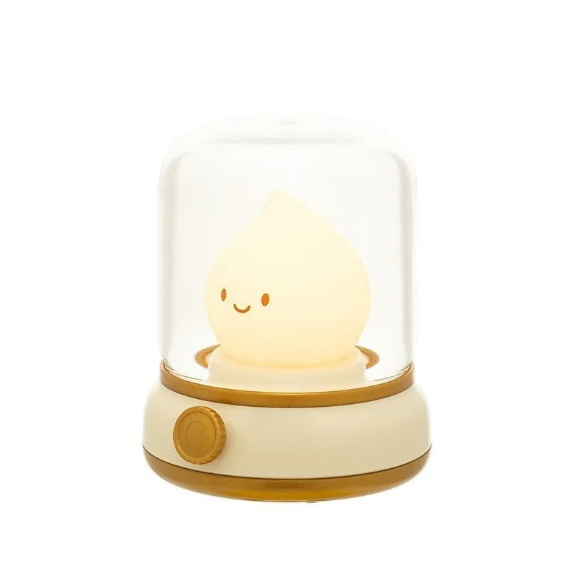 Green retro oil lamp design USB rechargeable LED desk night light on a wooden table.