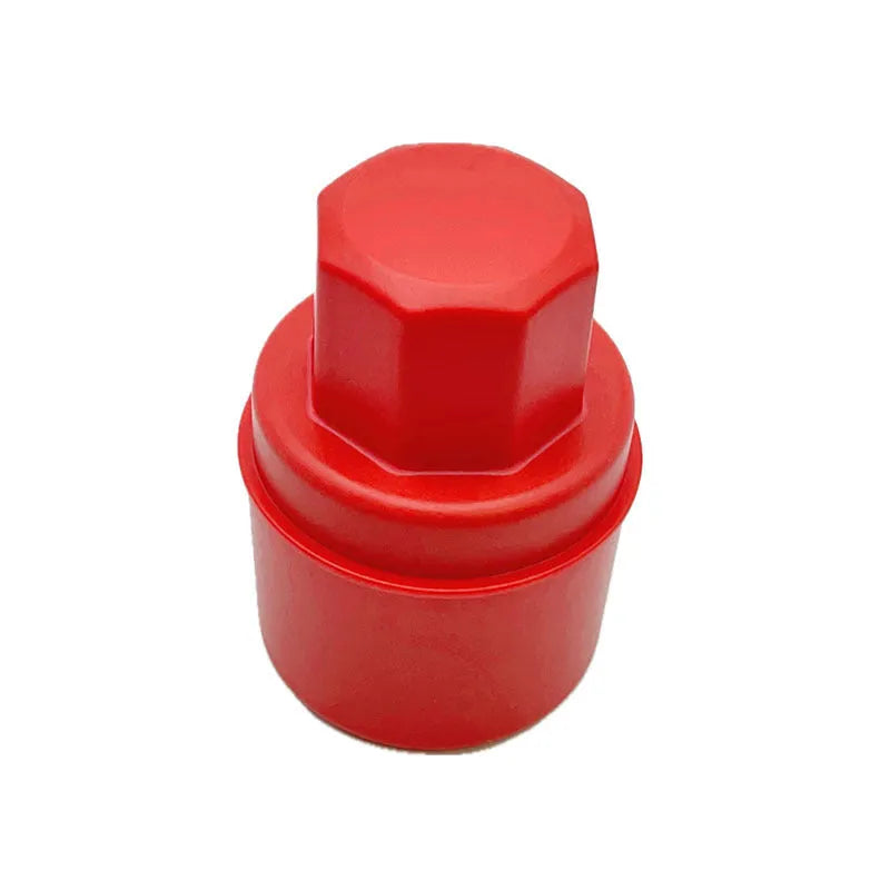Hand-held black tyre oil sponge brush with lid on a white background.