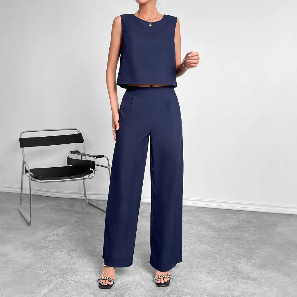Women's red sleeveless top and wide leg trousers two-piece set laid flat