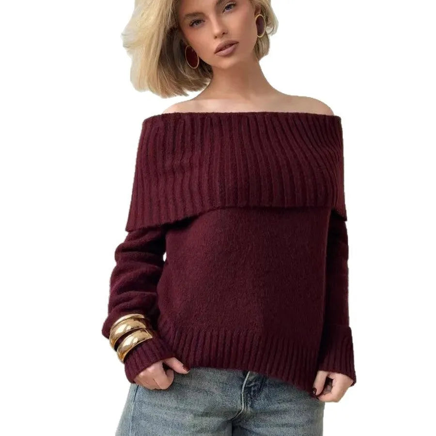 Grey off-the-shoulder sweater with a 3D textured pattern and regular sleeves on a model.