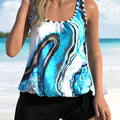 Blue tie-dye floral print women's swimsuit cover-up set with top and split-skirt shorts.