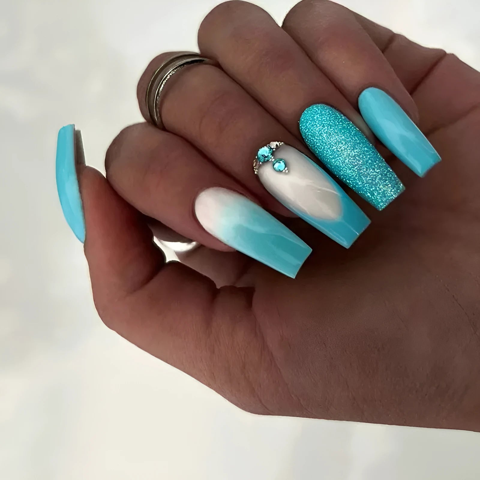 Long ballet false nail extensions in solid Z689 smart blue diamond colour with included glue