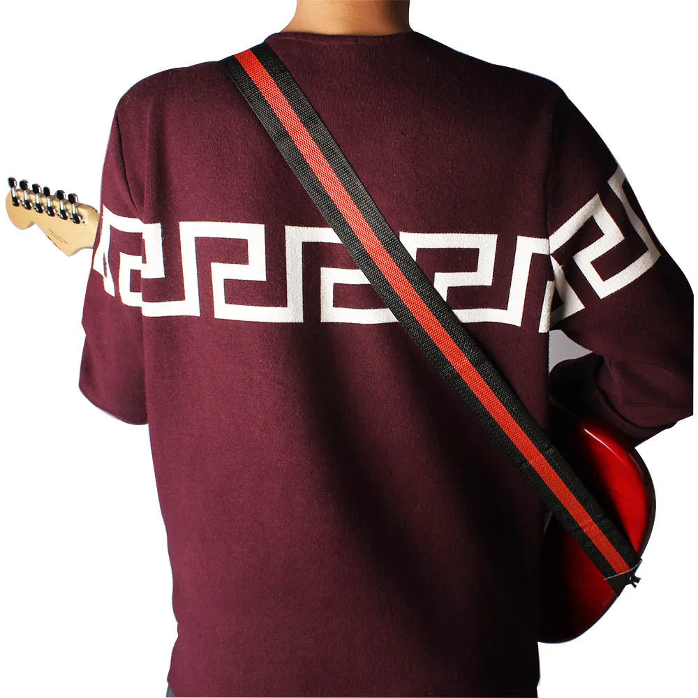 Universal woven musical instrument strap for guitar, bass, and ukulele in multiple colour options.