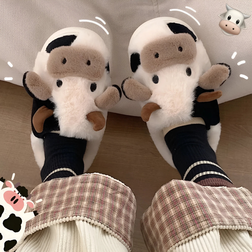 White cow-themed plush slippers for women with non-slip textured soles