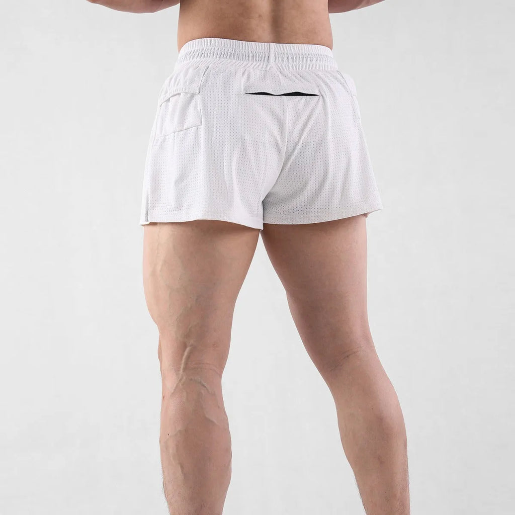A pair of men's black quick-drying nylon shorts with a mid waist, laid flat.