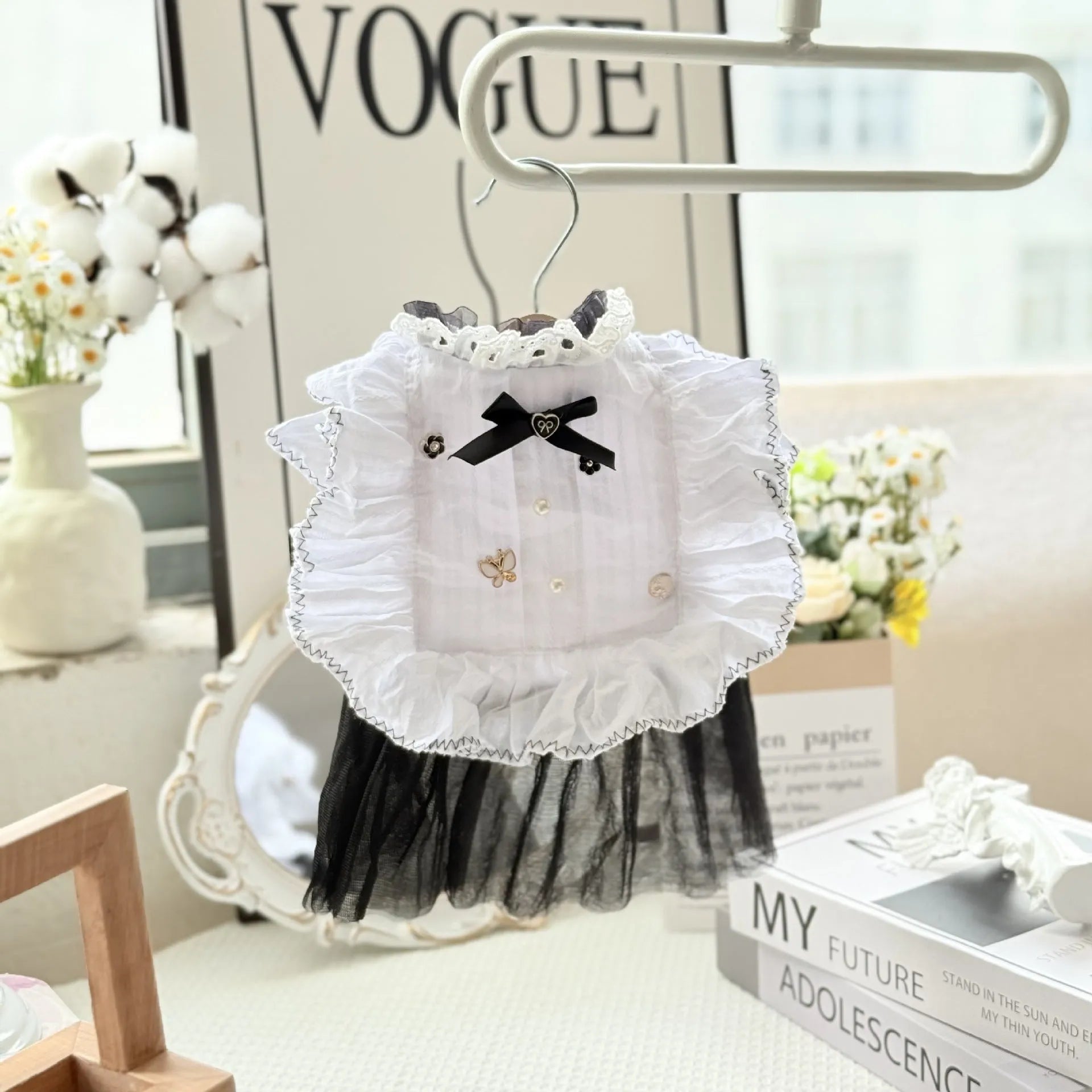 White polyester princess-style dog dress with a gauze skirt for small dogs.