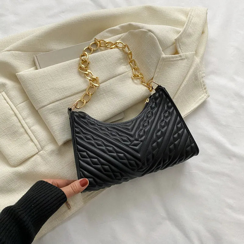 Brown PU leather pleated chain baguette shoulder bag showing adjustable strap and square shape