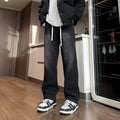 Blue straight-leg men's trousers with drawstring waist and cotton denim fabric