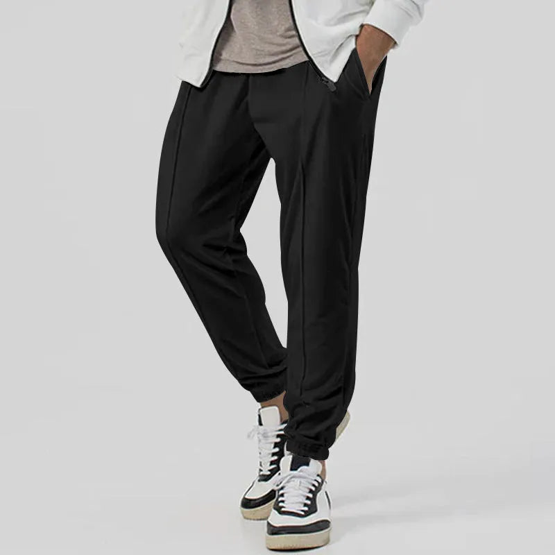Men's grey casual tapered sweatpants with an elasticated waistband and straight-leg design