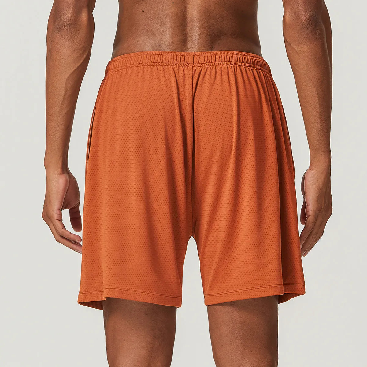 Men's double-layer quick-dry running shorts in sky green colour on a size chart.