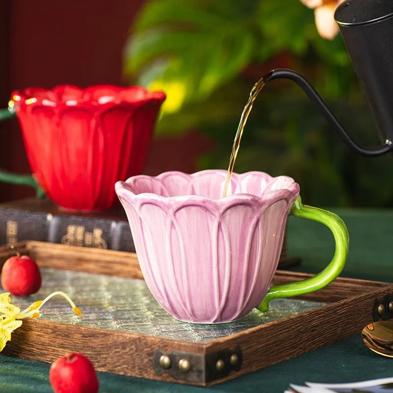 Ceramic breakfast cup with pastoral pattern, showing red and purple colour options.
