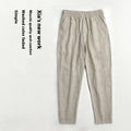 Men's lightweight cropped linen-cotton trousers in a striped pattern, shown in khaki colour.