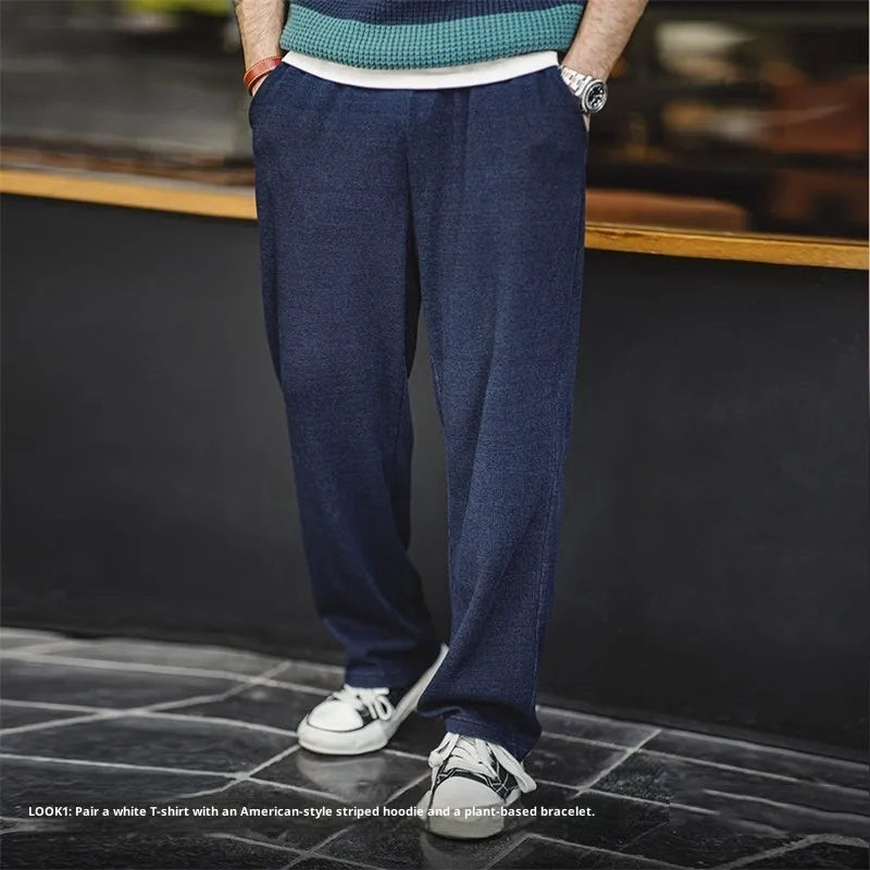 Men's indigo polyester straight fit casual trousers with micro elastic waist, front view