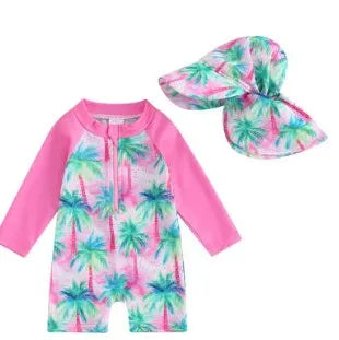 Green polypropylene fibre one-piece long-sleeve baby swimsuit with matching hat on neutral background