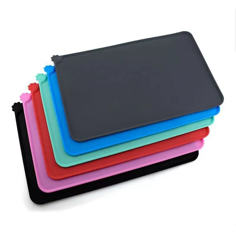 Silicone pet placemat under dog and cat food bowls in multiple colours and sizes