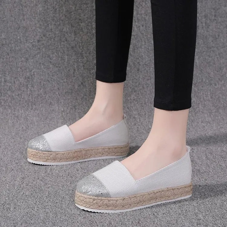 Black and Milky White plus-size canvas oversleeve shoe covers showing round toe design.