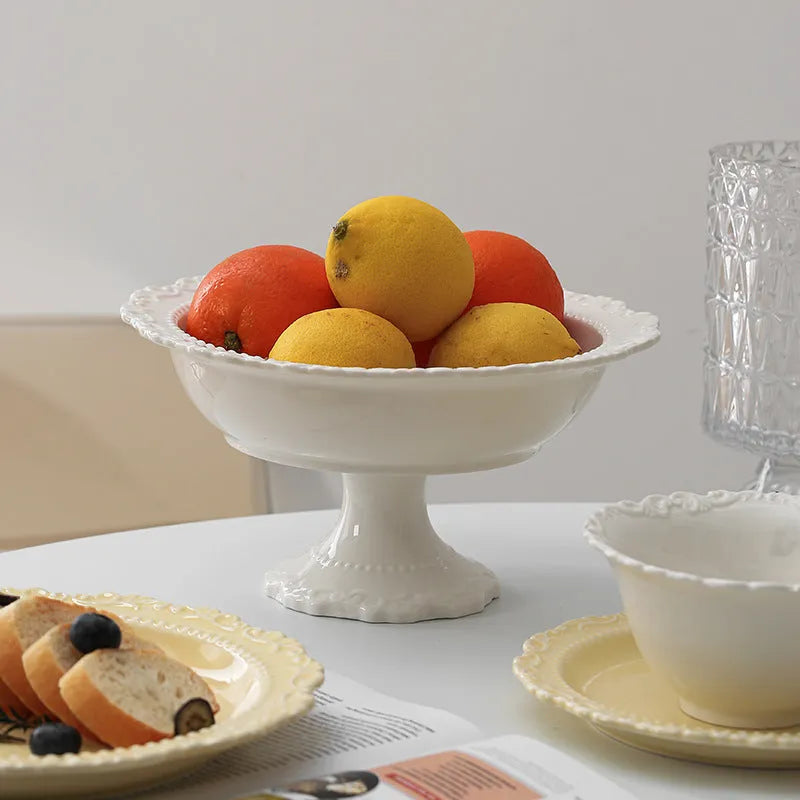 Cream ceramic lace vintage plate with irregular shape and coloured glaze, in white or yellow