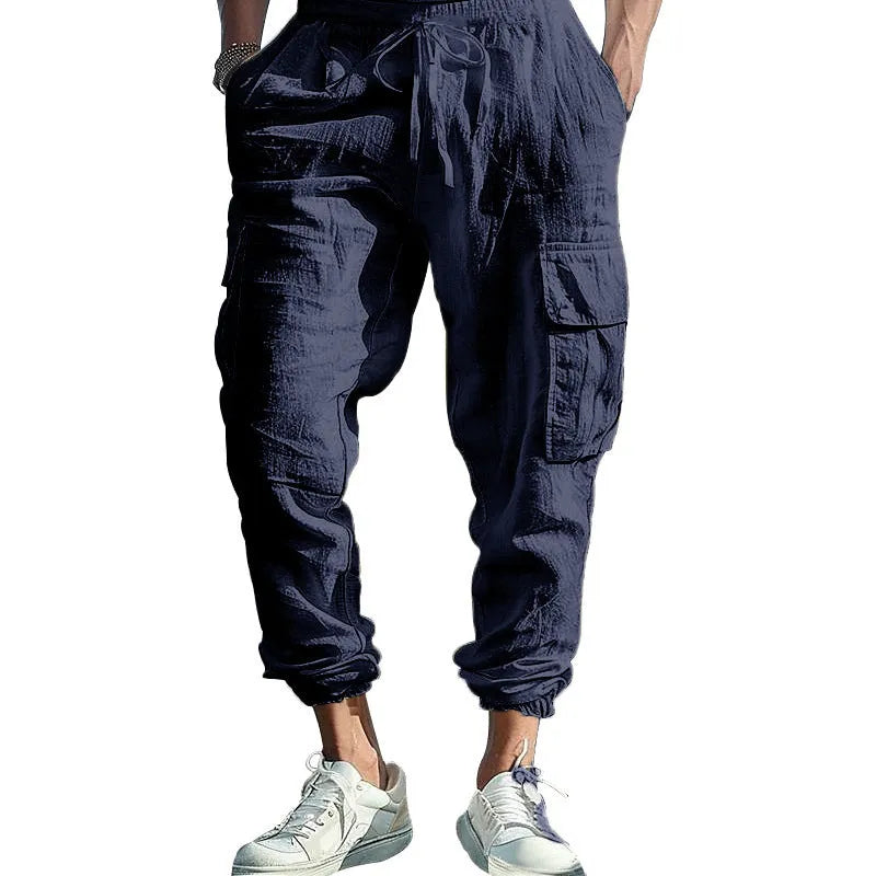 Men's casual ankle-tied linen trousers in Army Green colour showing multi-pocket design