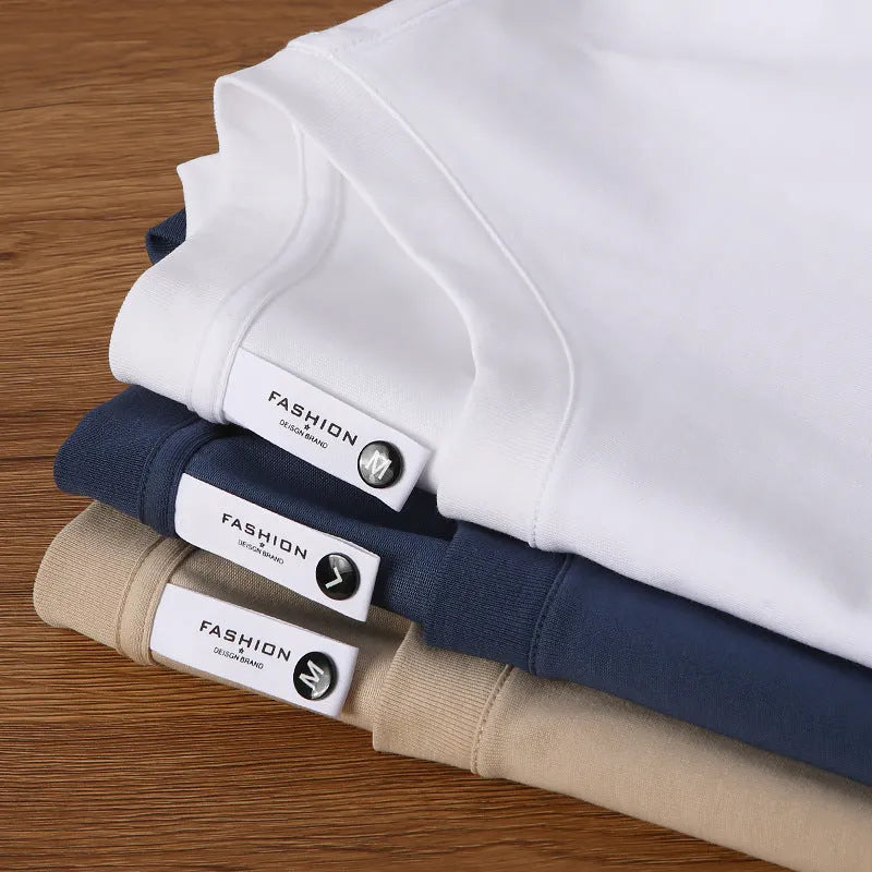 Man wearing a heavyweight apricot coloured drop shoulder loose fit t-shirt for casual wear.