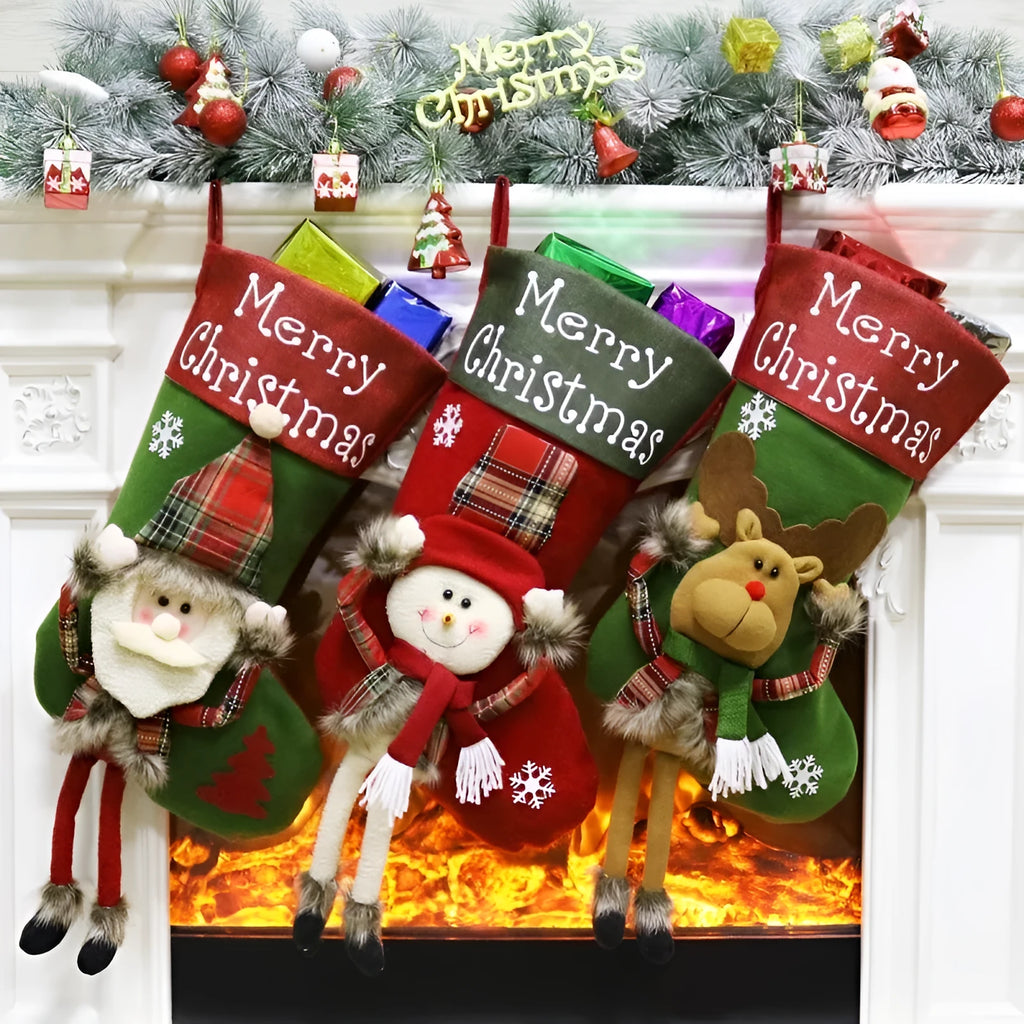 Three large Christmas stockings with Santa Snowman Reindeer 3D plush designs for holiday tree decoration