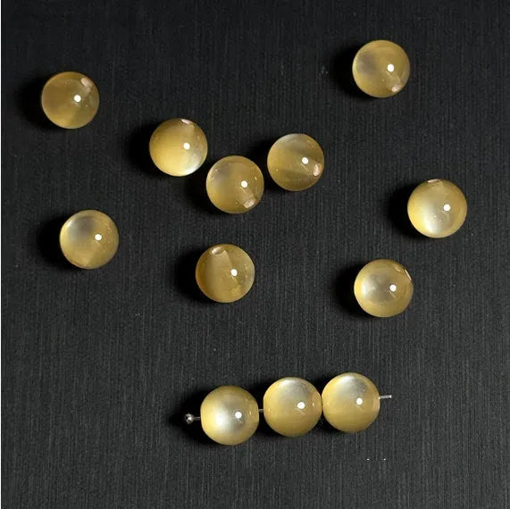 Cat eye round resin beads in 10mm size with epoxy finish