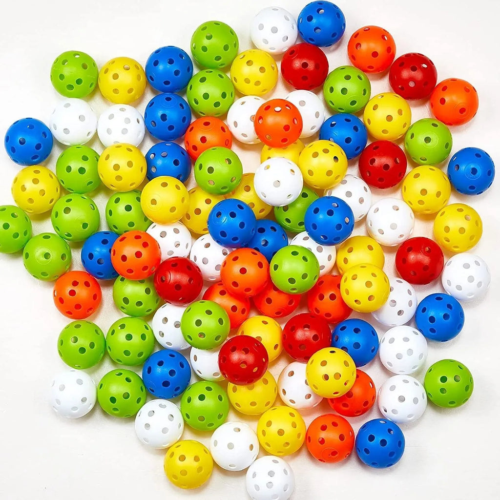 Multi-colour 42mm diameter golf practice balls with 26-hole design in a net pocket