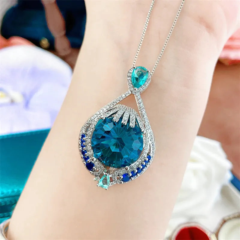 Women's geometric blue crystal necklace on water wave chain