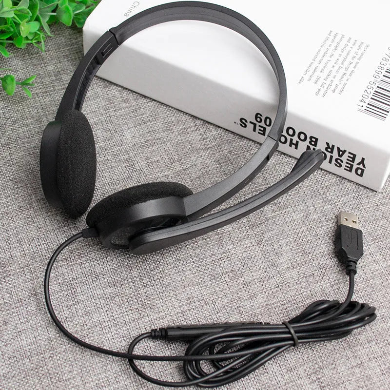 Black USB wired gaming headset with microphone, sponge ear pads and PVC cable for PC computer use