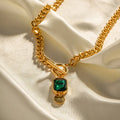 Gold electroplated titanium steel French retro pendant necklace with geometric design and emerald zircon stones