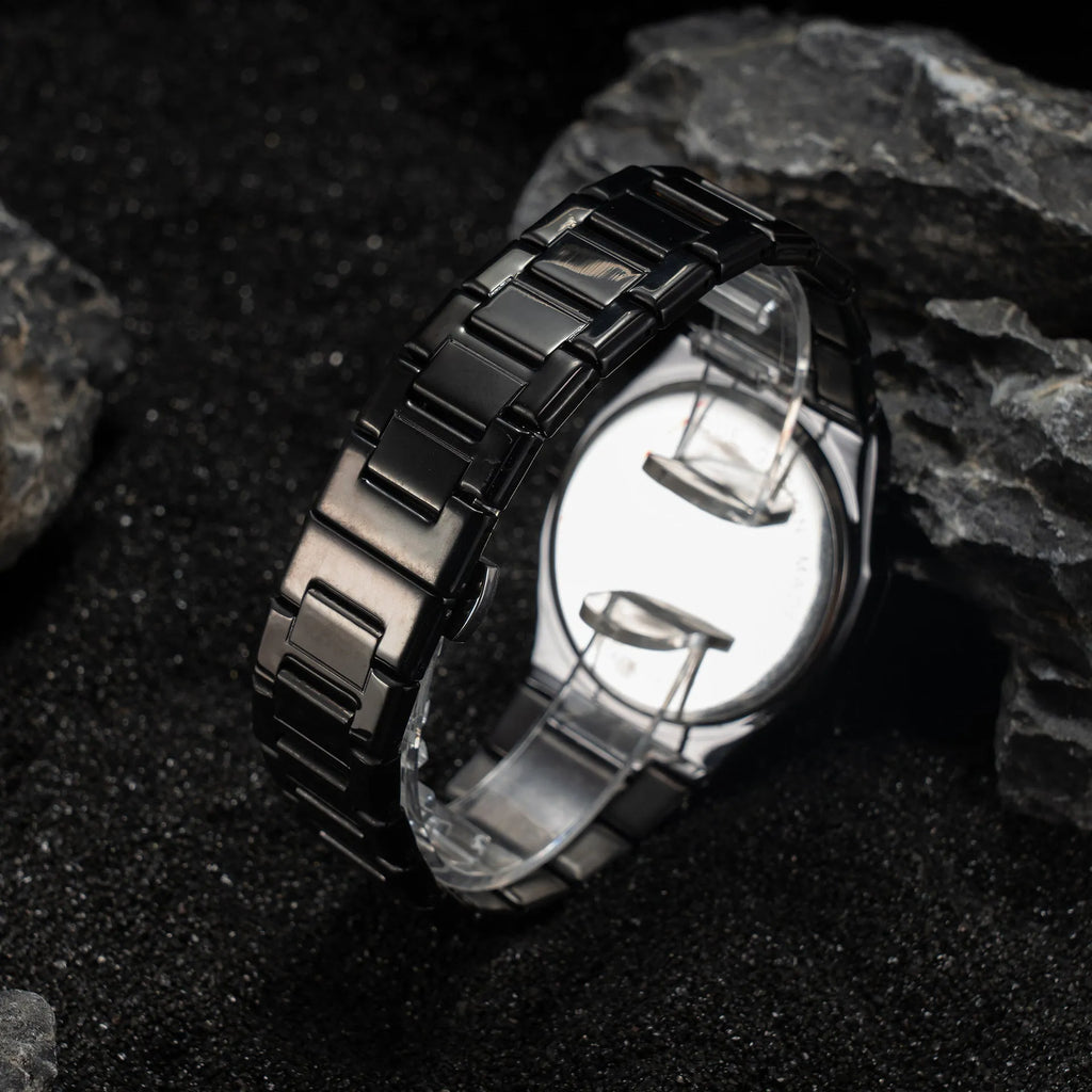 Men's business casual quartz wristwatch with stainless steel bracelet, 10mm thick case, shown in black and silver colour variants.