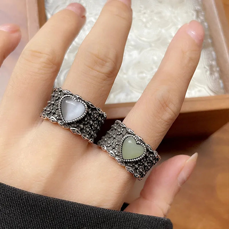 Retro style adjustable silver ring with a large heart shape and moon design in white or green colour.