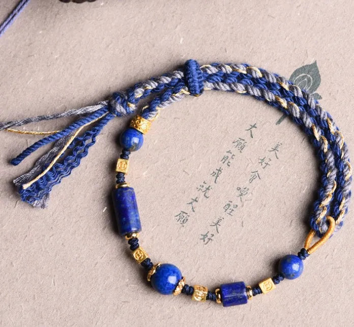 Hand woven ethnic bracelet with lapis lazuli colour and rope design on flexible wire