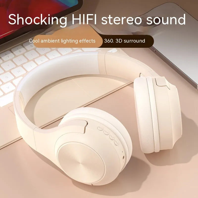 Wireless Bluetooth over-ear headphones in ivory white, chalk black, or youth green with a portable charging case.